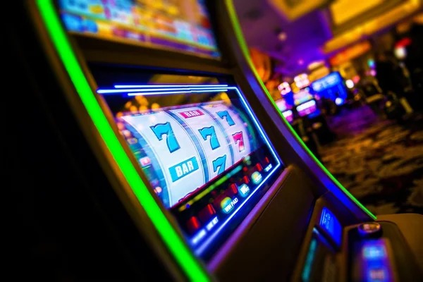 Live blackjack table streamed on mobile device showing dealer and card layout